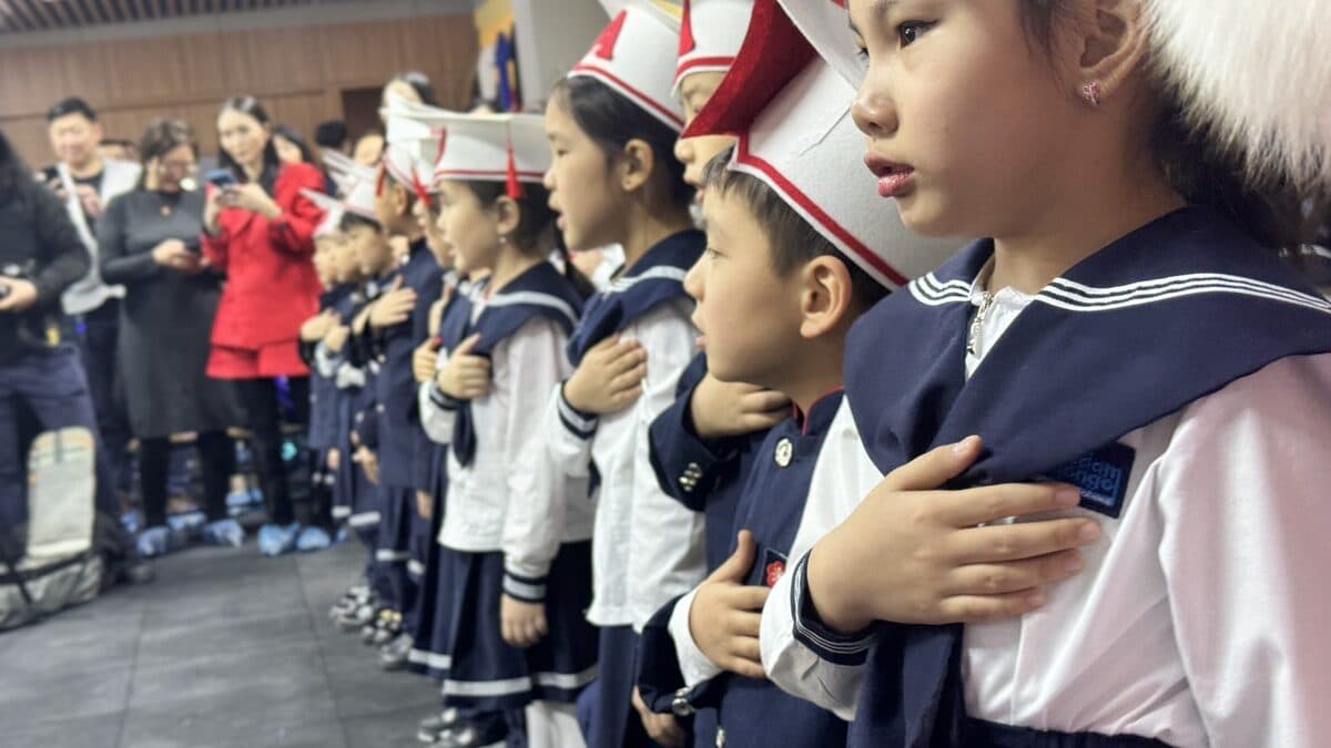 Students singing the national anthem