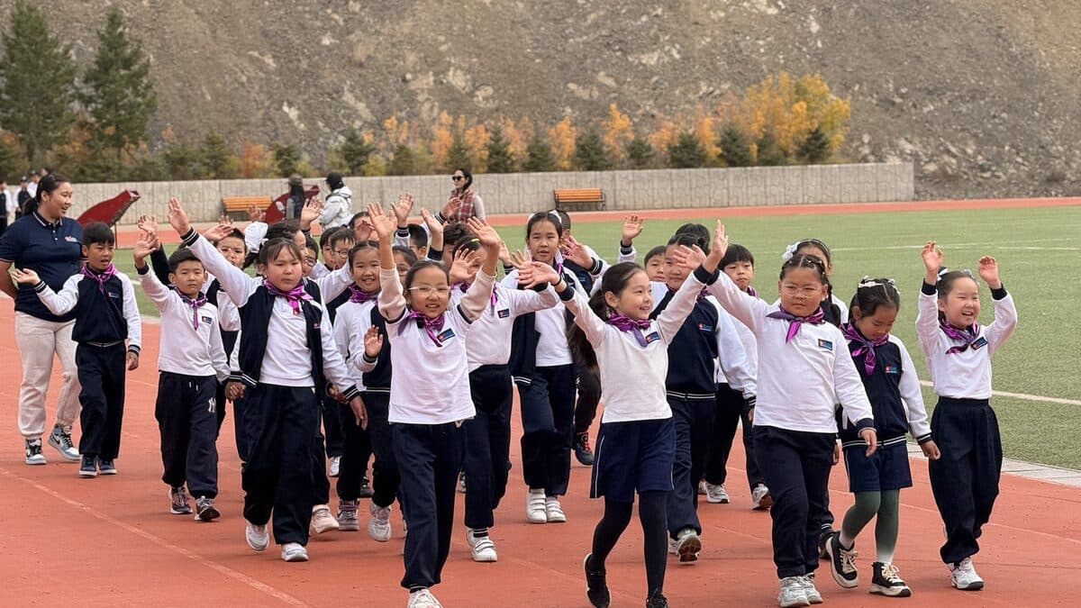 Primary school students walking together at an event